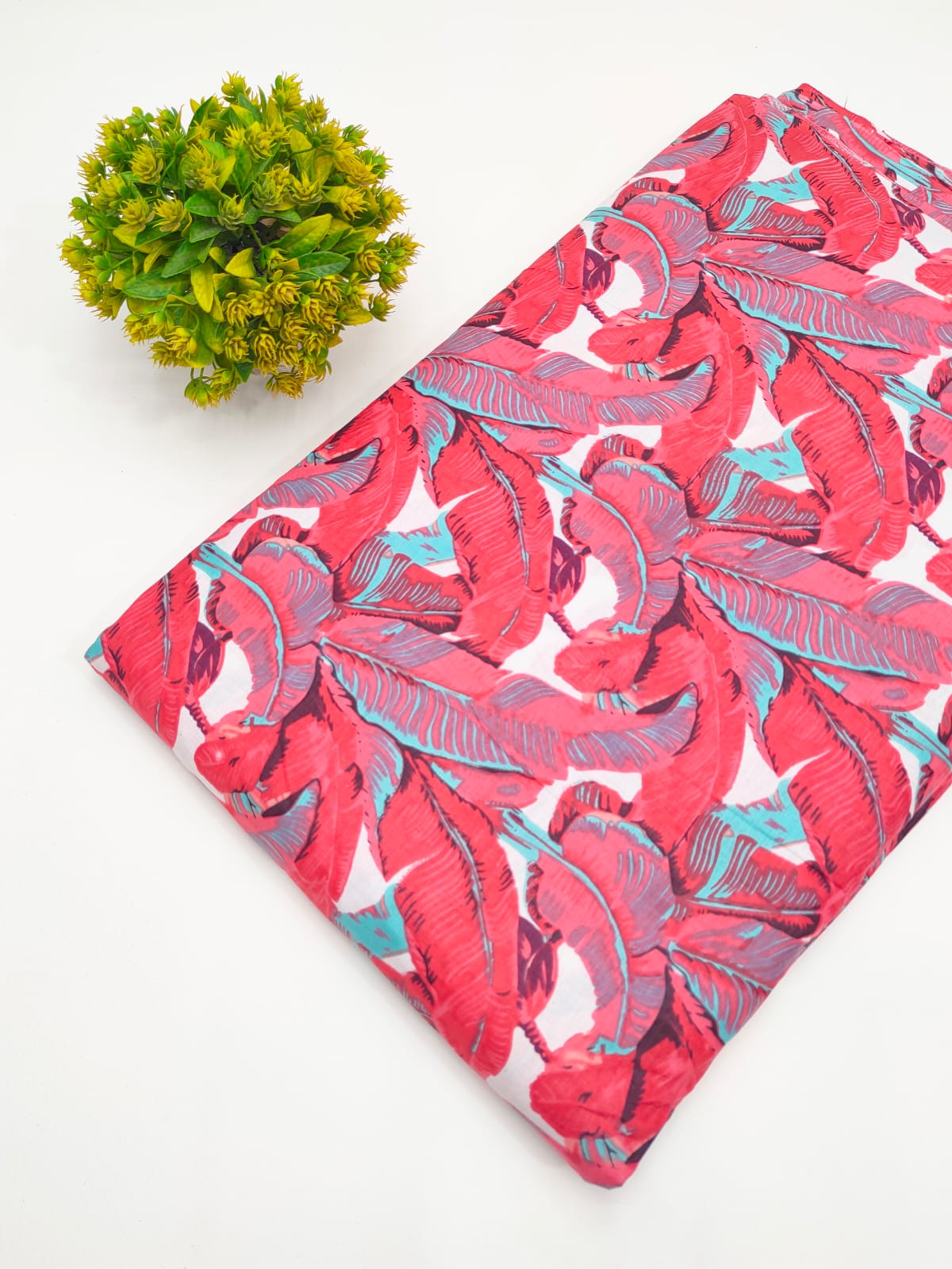 Pink and aqua tropical leaf screen print pure cotton fabric India