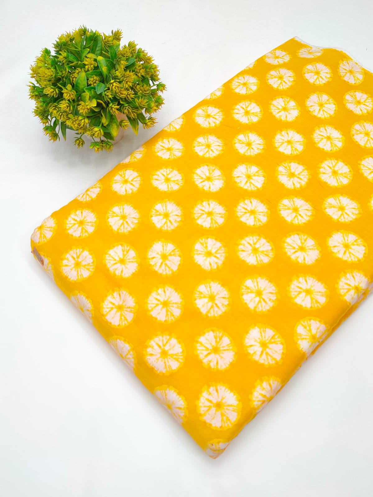 Yellow geometric screen printed cotton fabric India