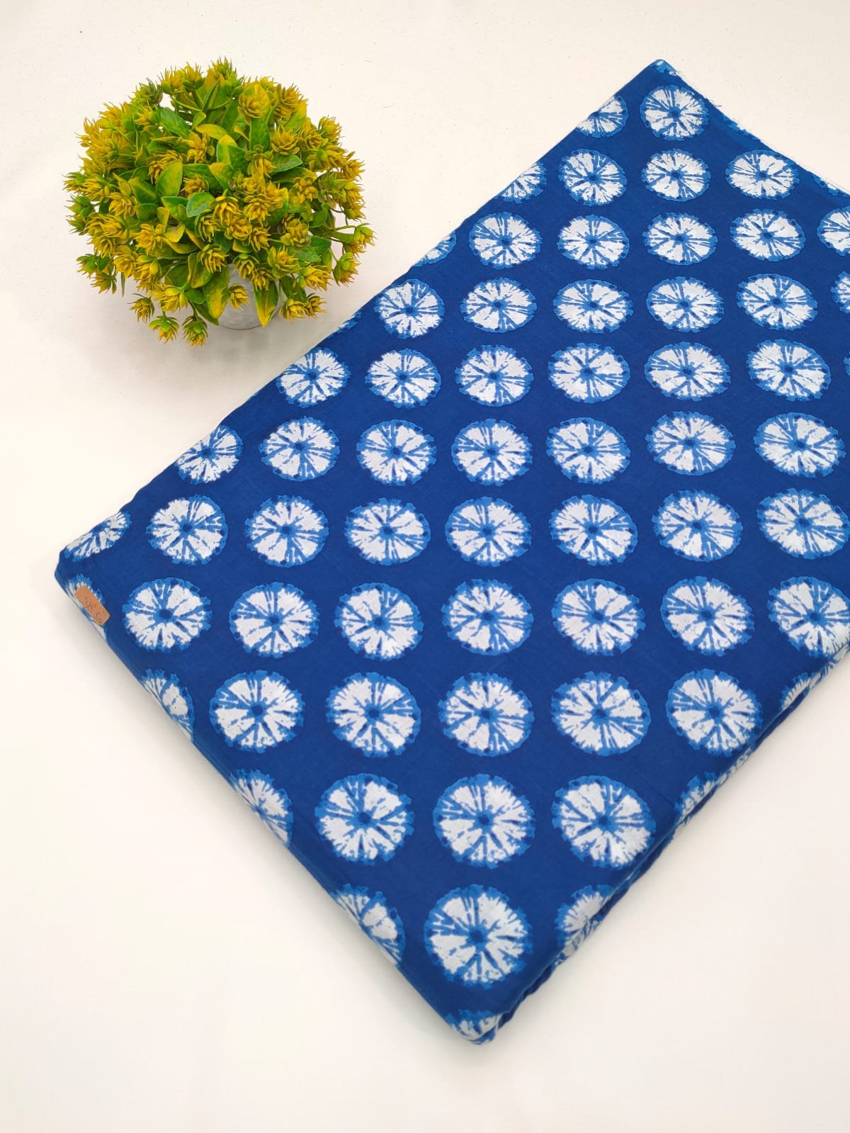 Blue circular design screen print fabric India