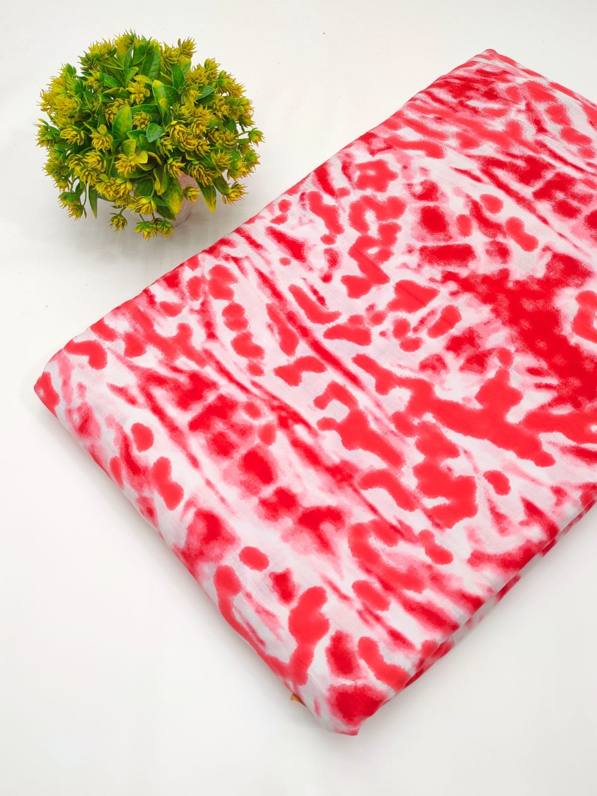 Red abstract screen print cotton fabric India