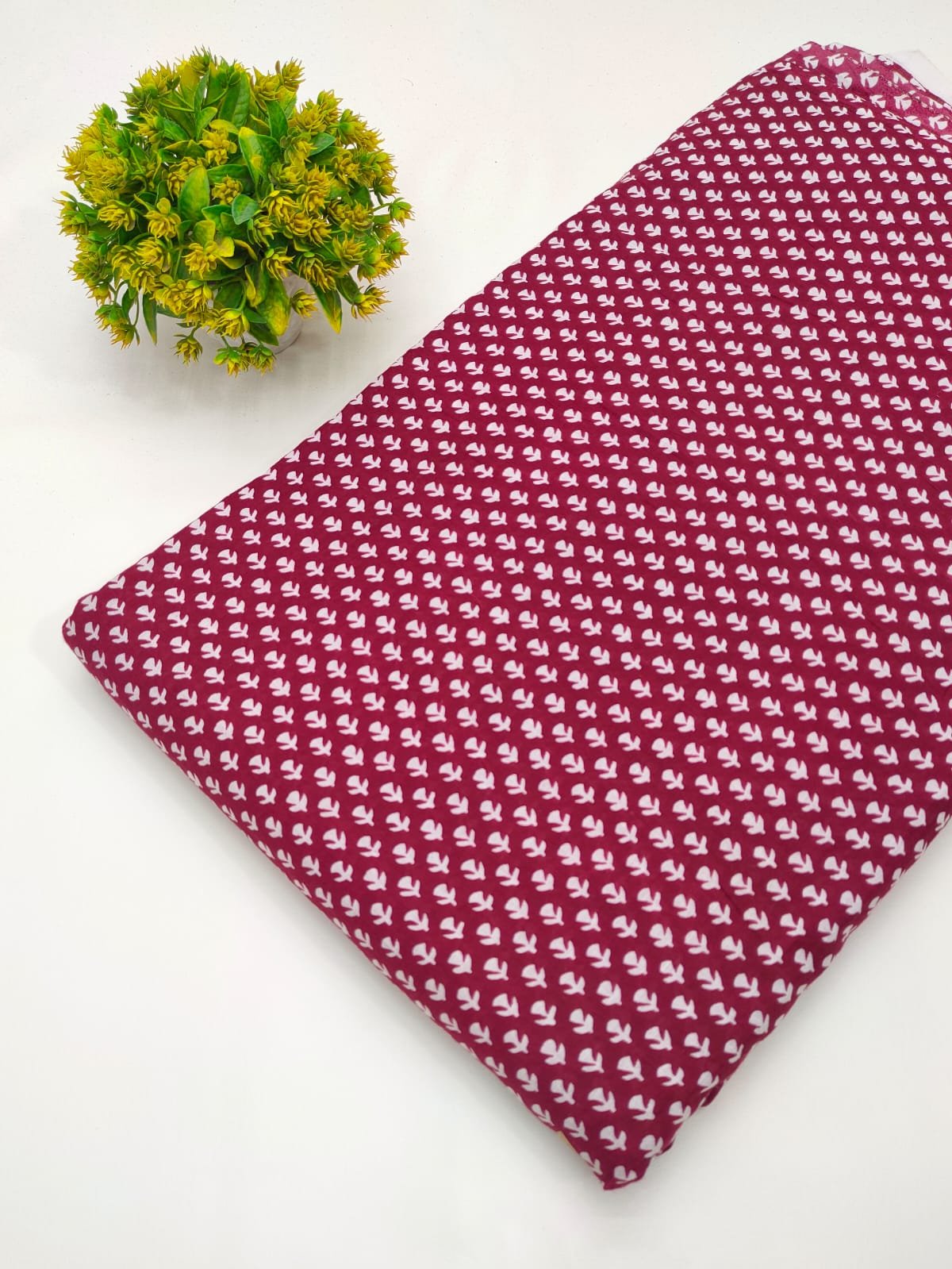Maroon geometric screen print cotton fabric India