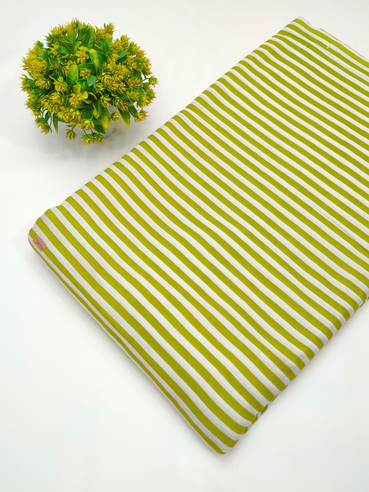 Yellow and white striped cotton fabric India