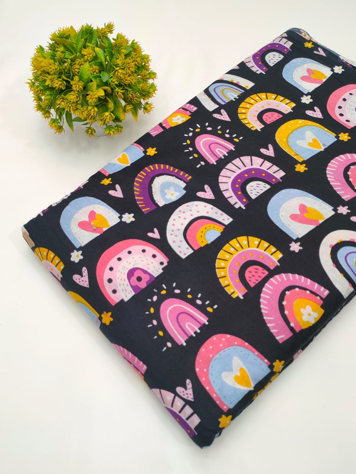Black cotton fabric with multicolour graphic print