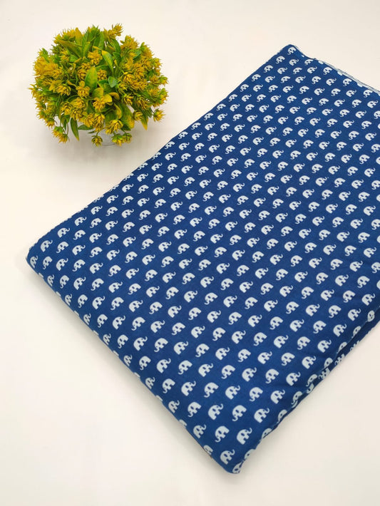 Blue cotton fabric with white ethnic motif print
