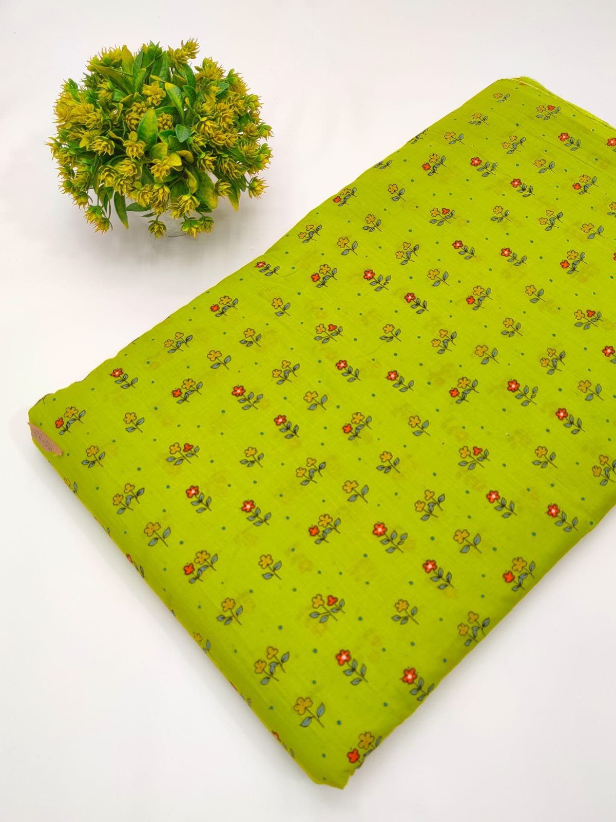 Green cotton fabric with small floral screen print