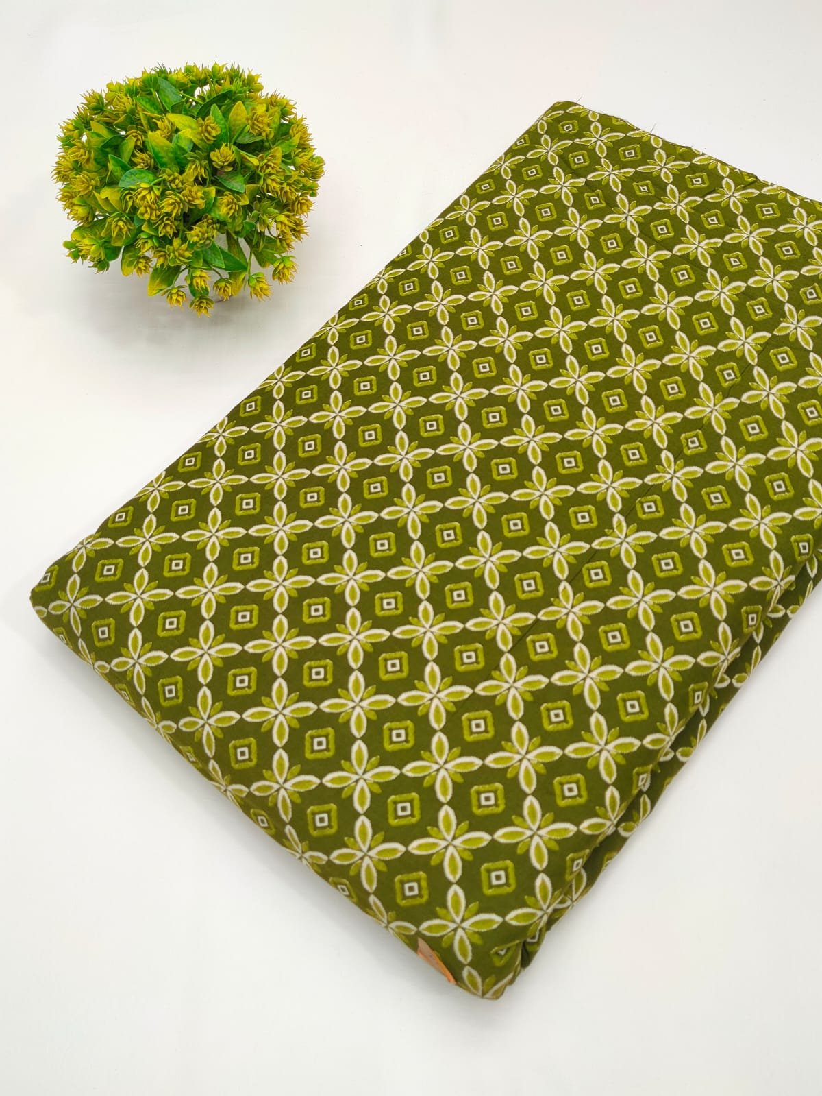 Green geometric screen print cotton fabric India