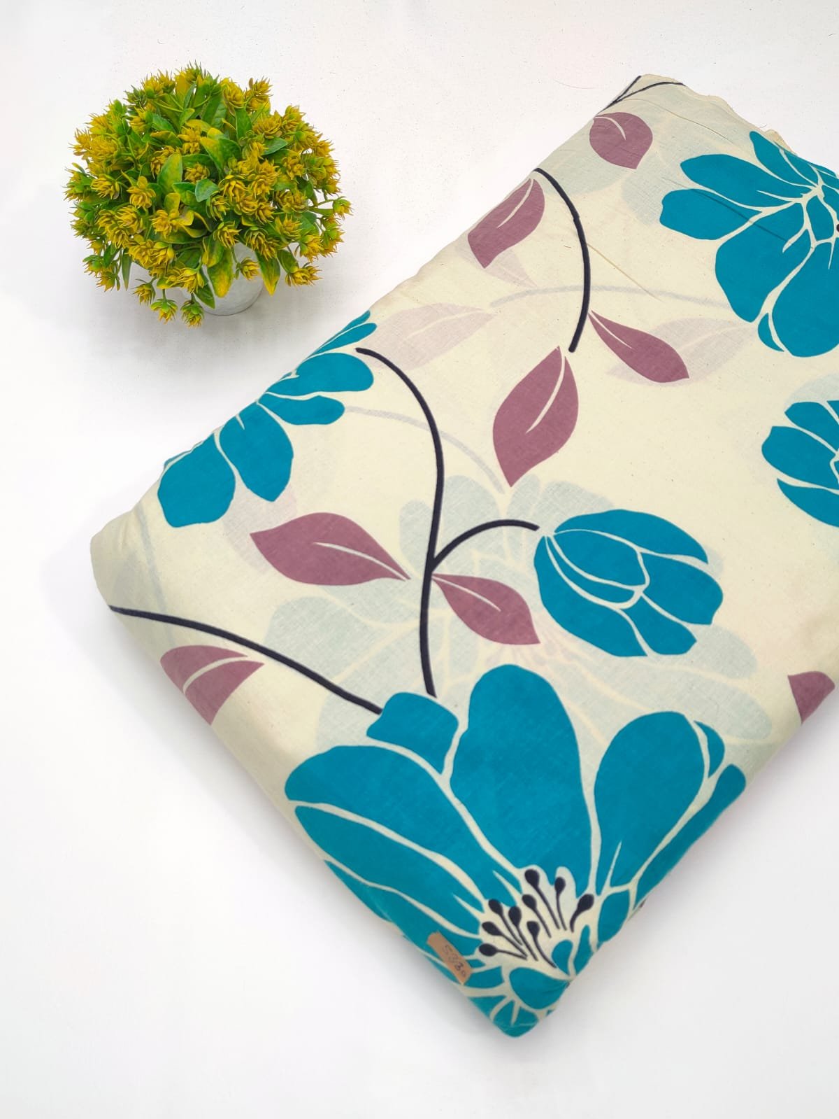 Beige and blue graphic cotton fabric India