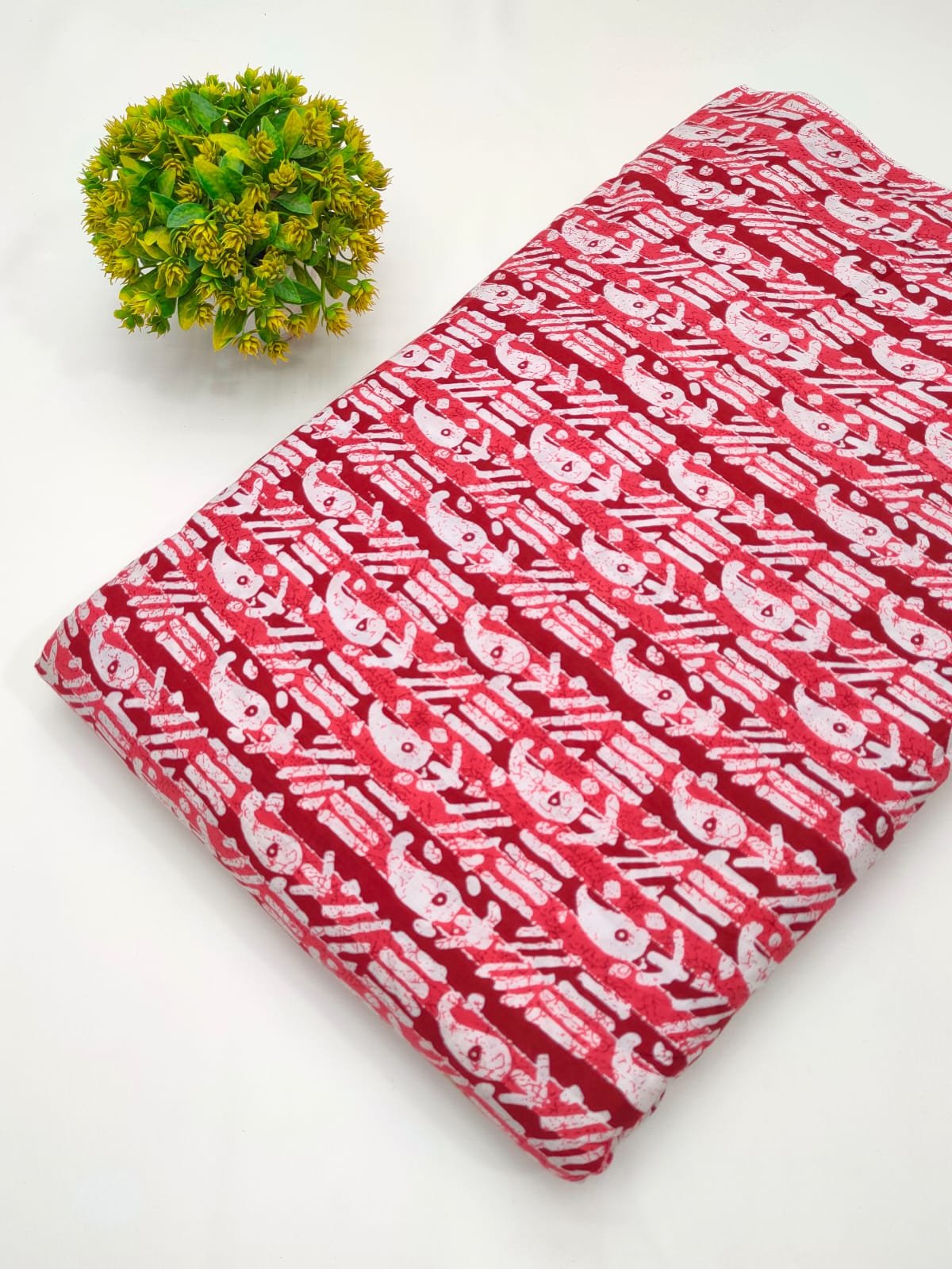 Red graphic screen print cotton fabric India