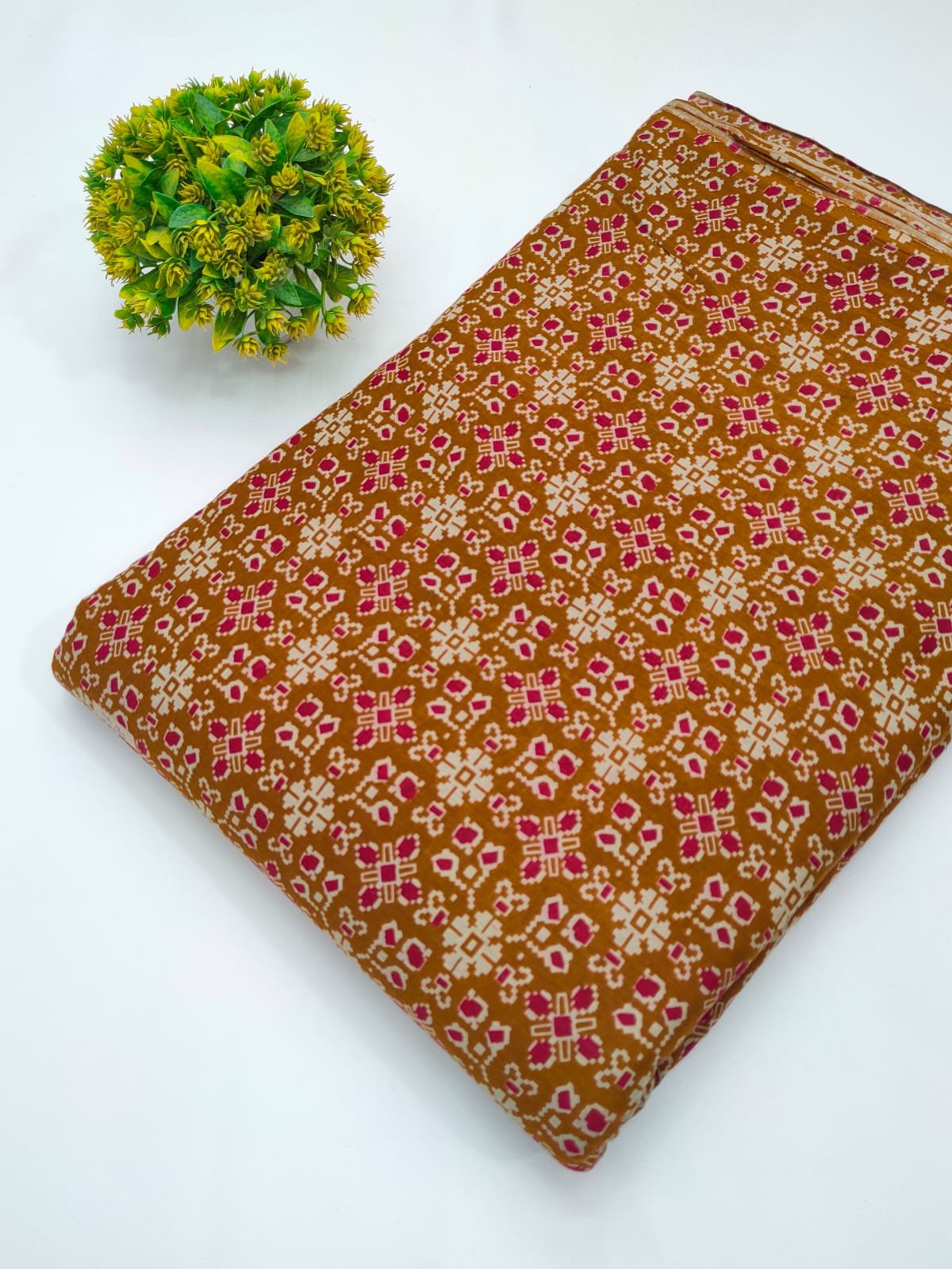 Brown geometric screen printed cotton fabric India
