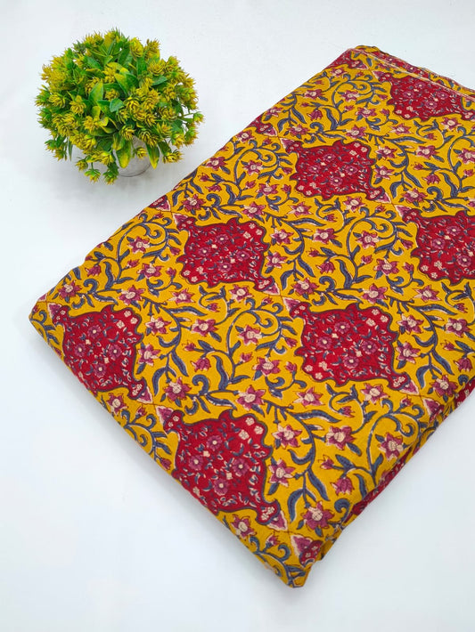 Yellow-red ethnic motif cotton fabric India