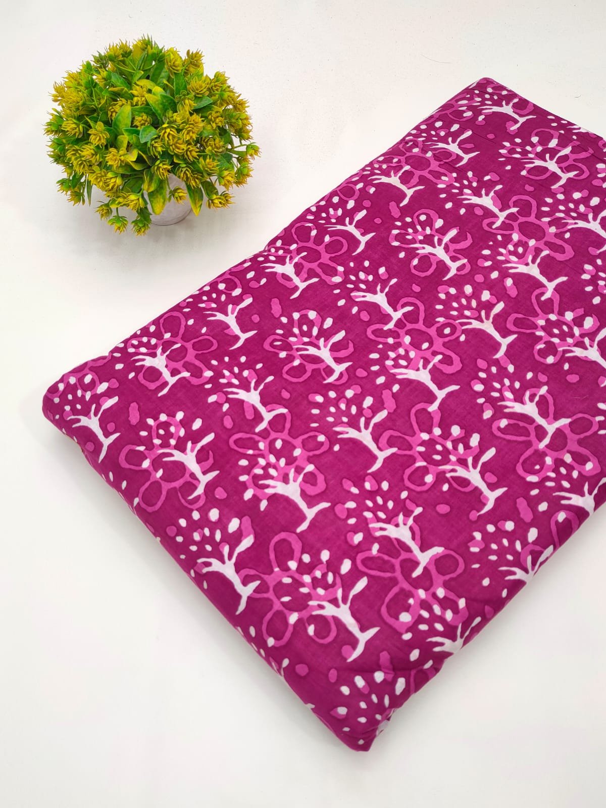 Magenta floral screen printed cotton fabric