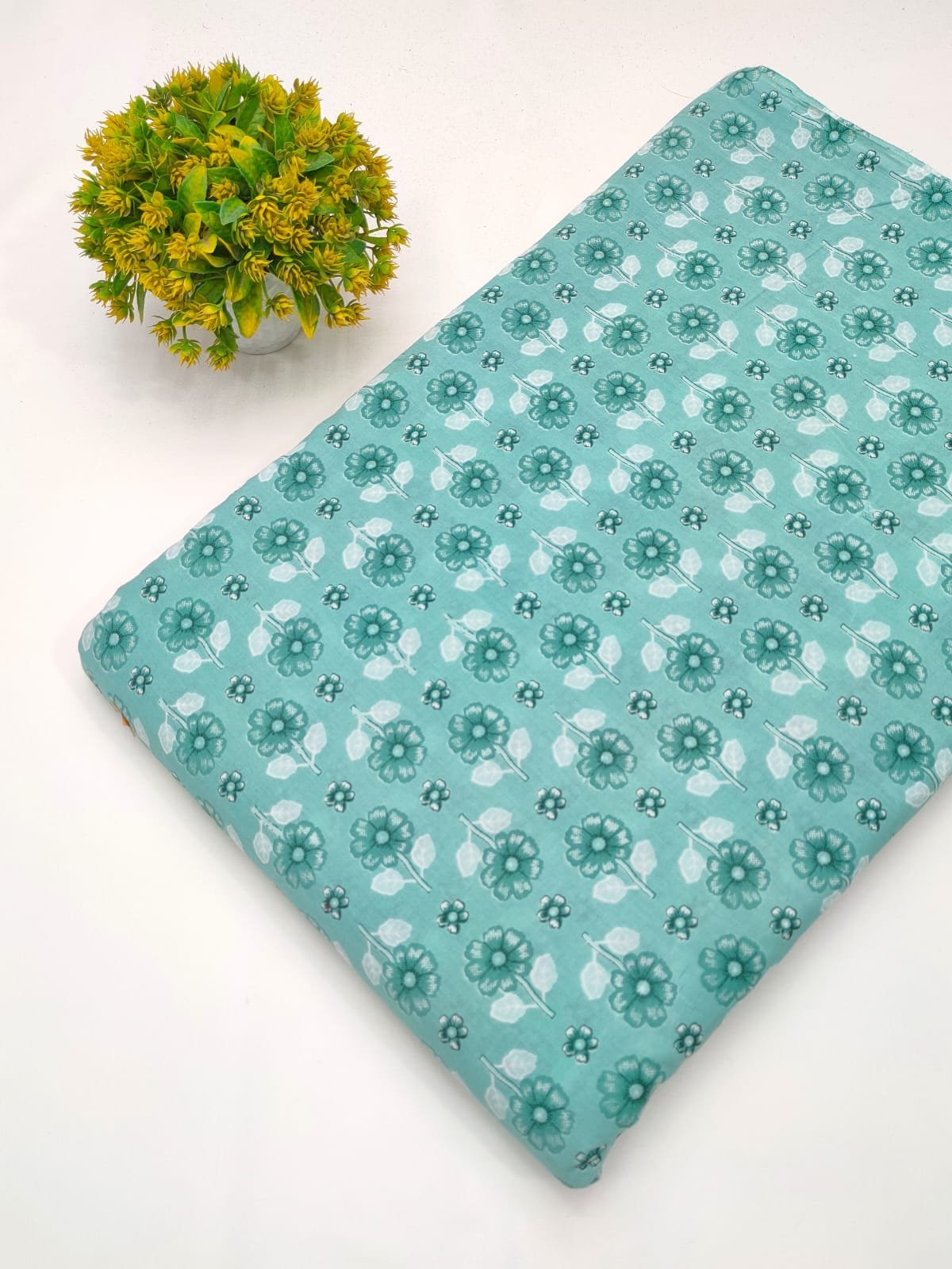 Teal floral screen printed cotton fabric
