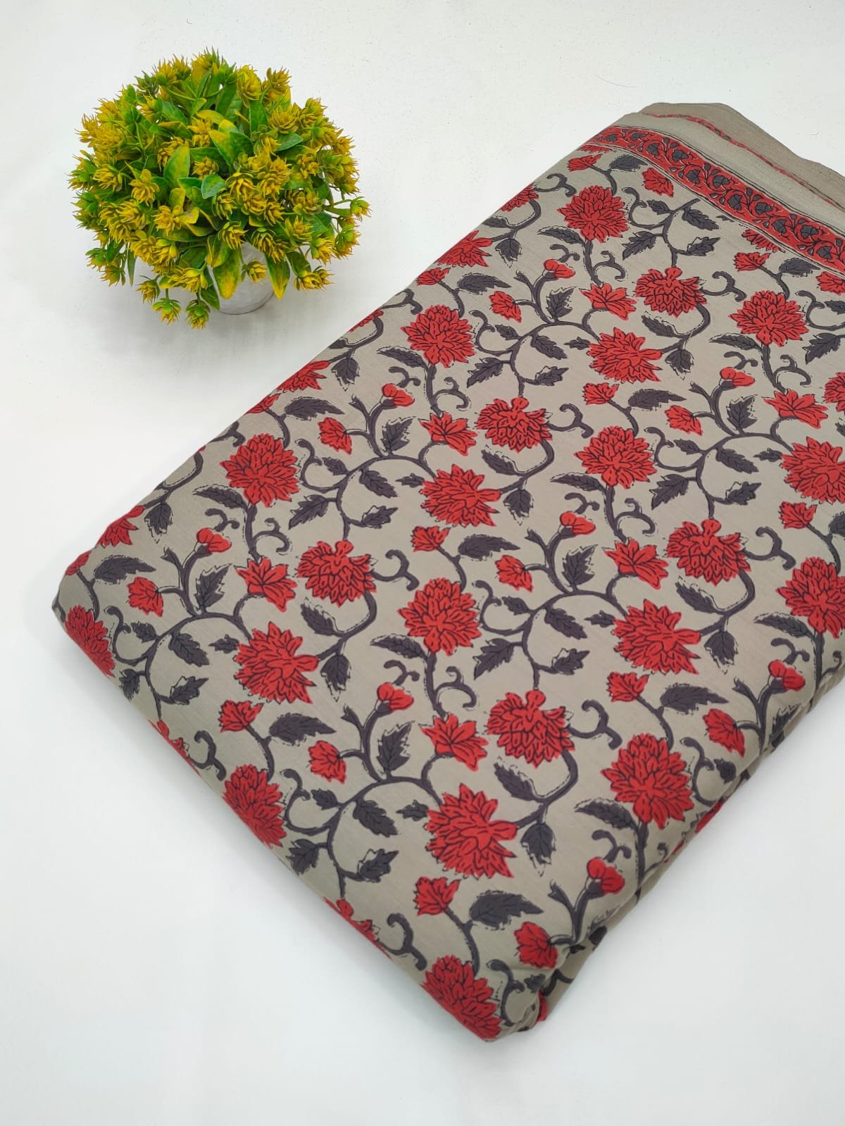 Grey fabric with red floral screen print design