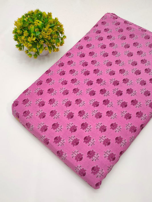 Pink fabric with small floral screen print design