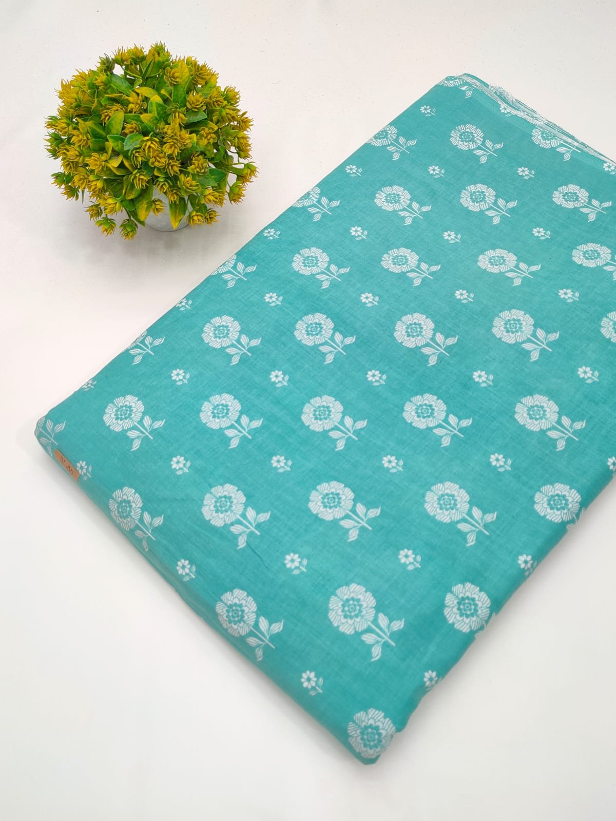 Turquoise floral screen print cotton fabric India