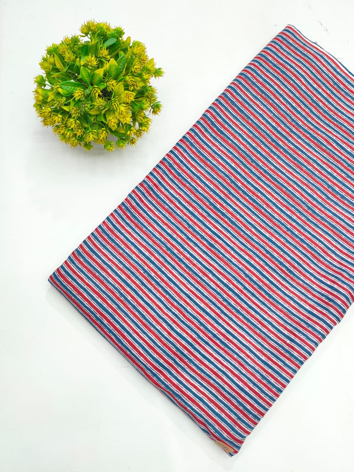 Red and blue striped cotton fabric India
