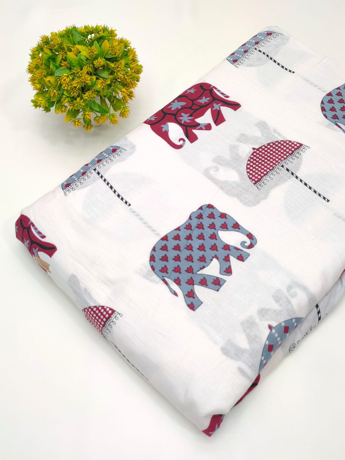 White elephant motif screen printed cotton fabric