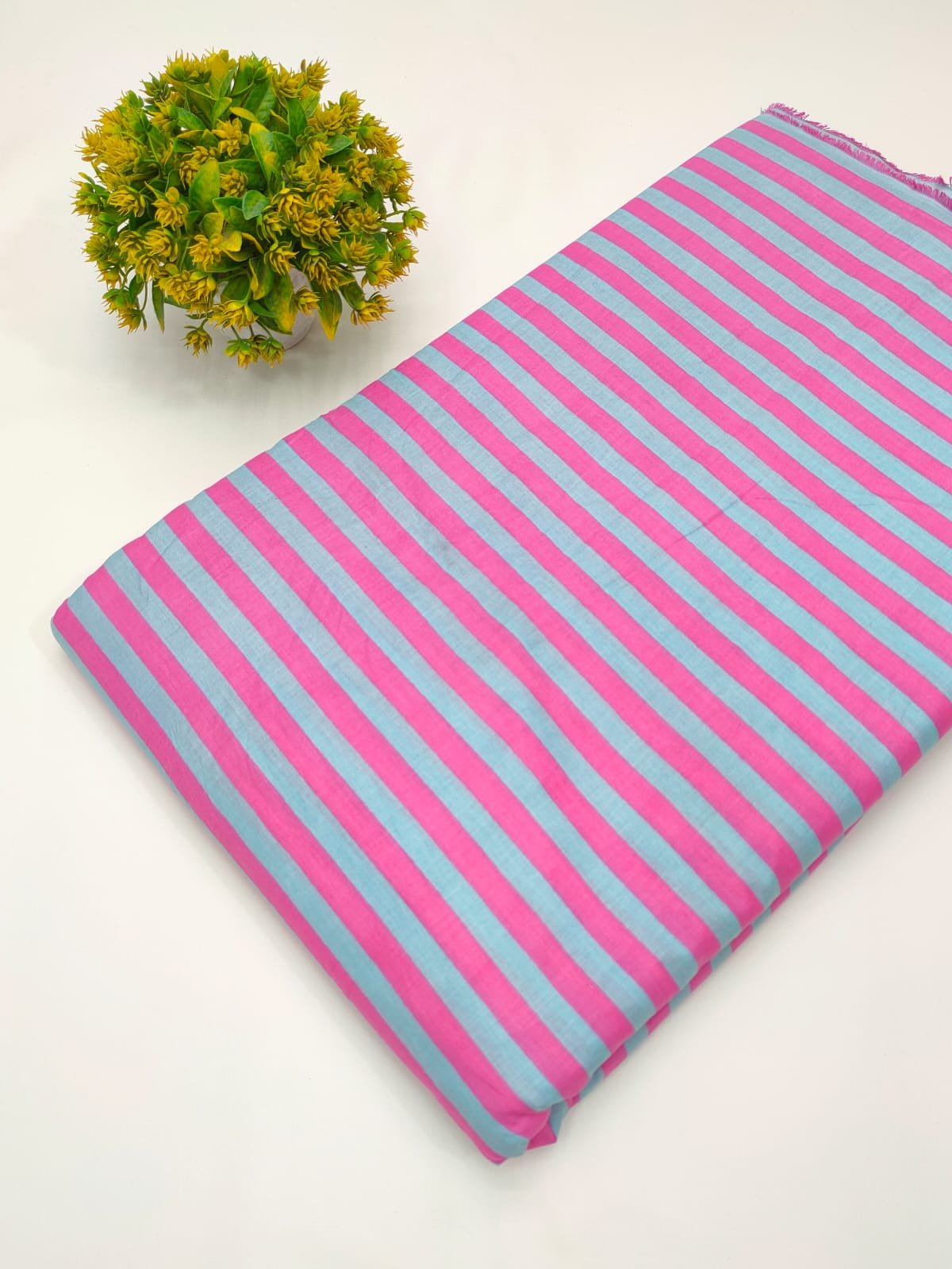 Pink blue striped cotton fabric India