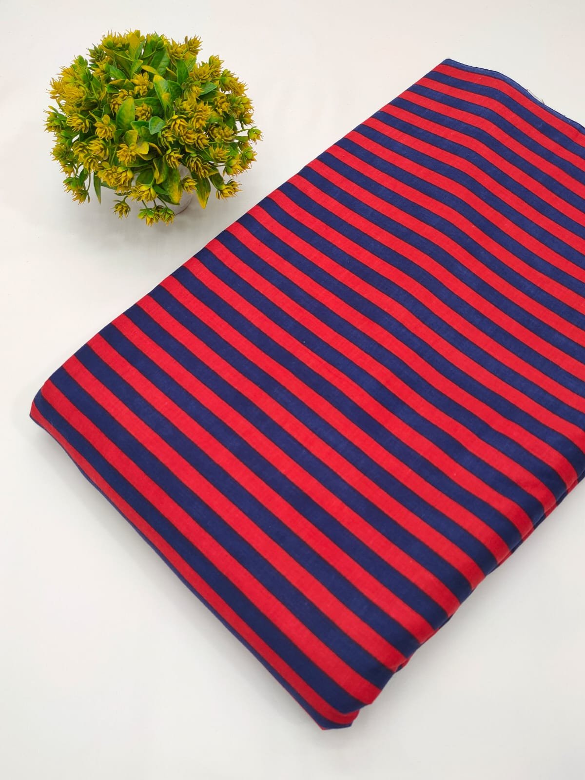Red and blue striped cotton fabric India