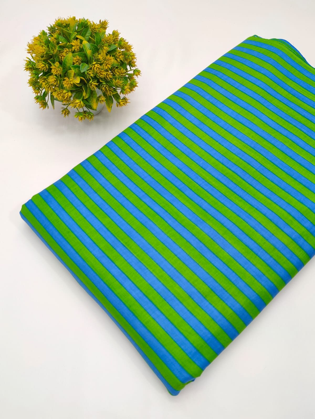 Green and blue striped cotton fabric India