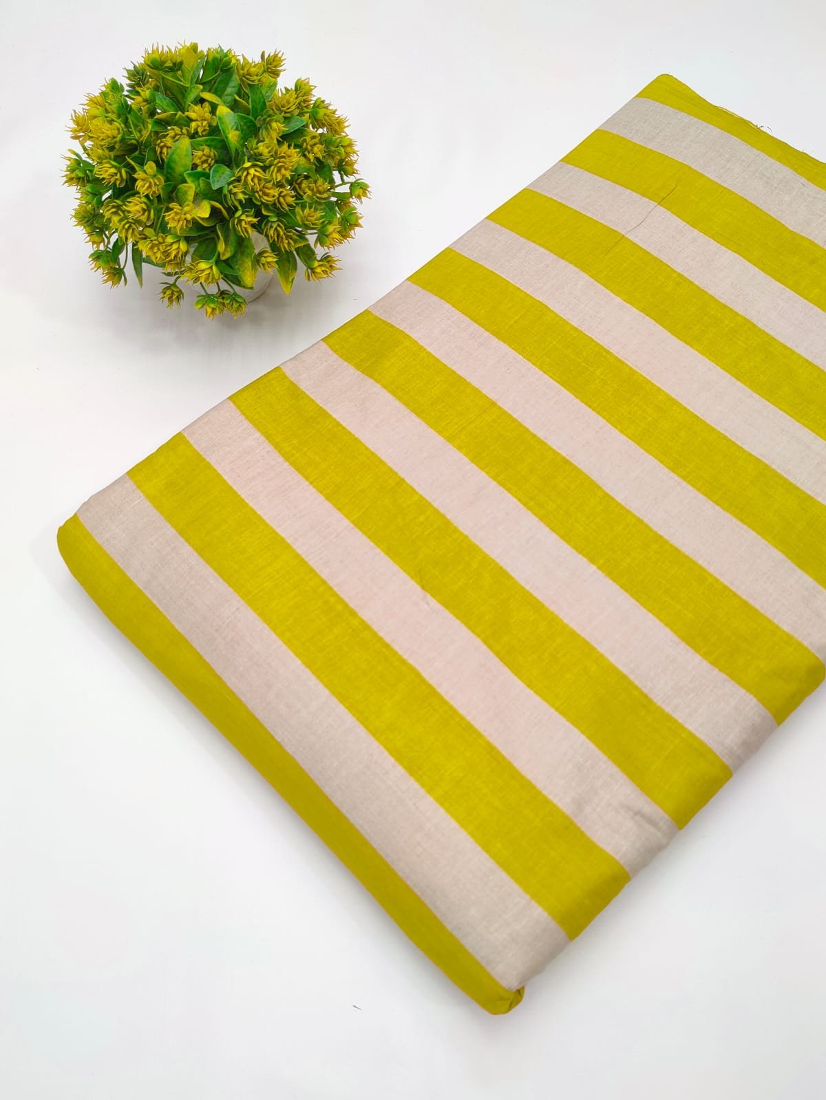 Yellow and white striped cotton fabric India