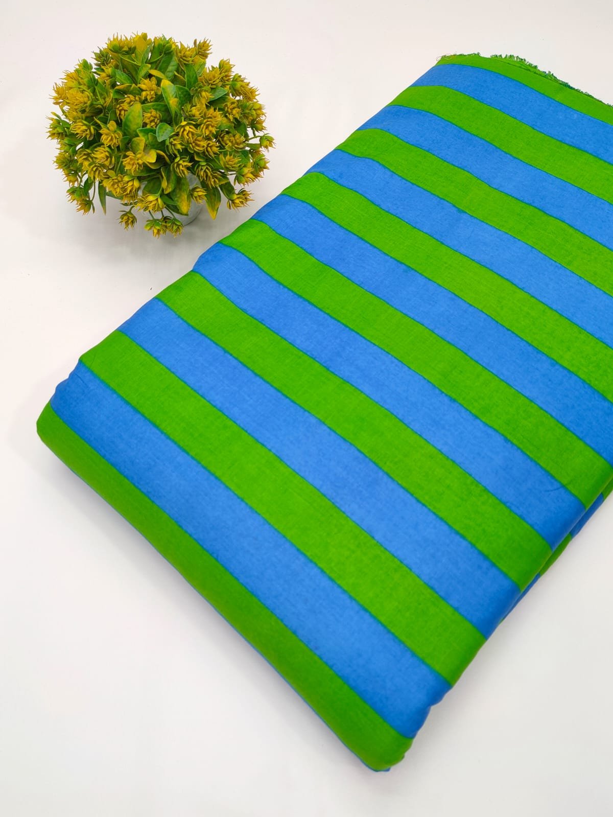 Blue and green striped cotton fabric India