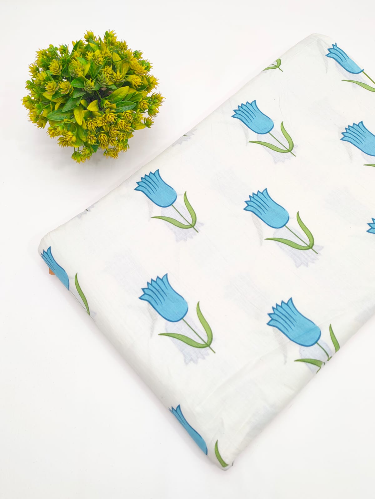 Sky blue tulip floral motif screen print cotton fabric India