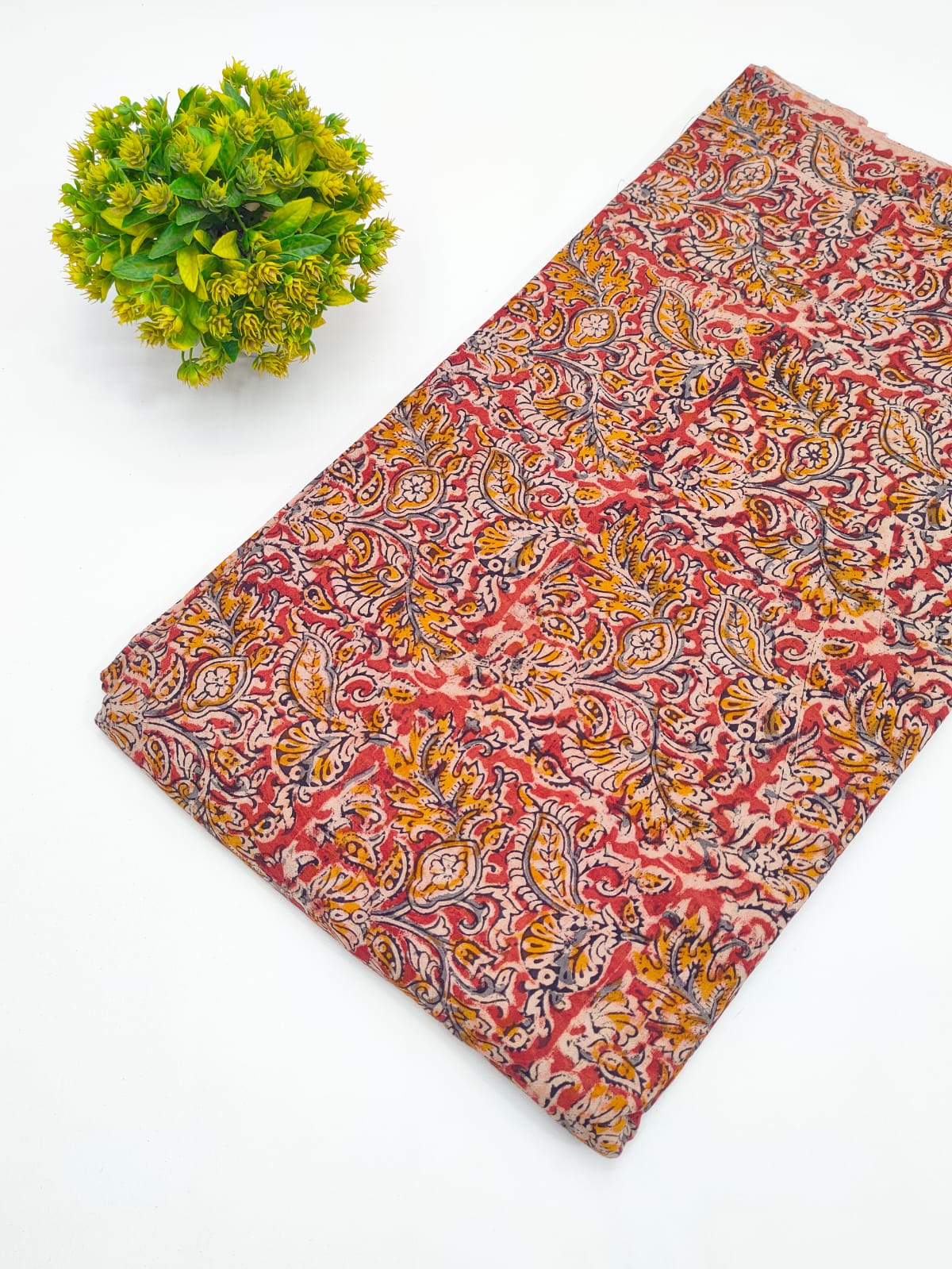 Terracotta and mustard paisley jaal Sanganeri hand block print pure cotton fabric India